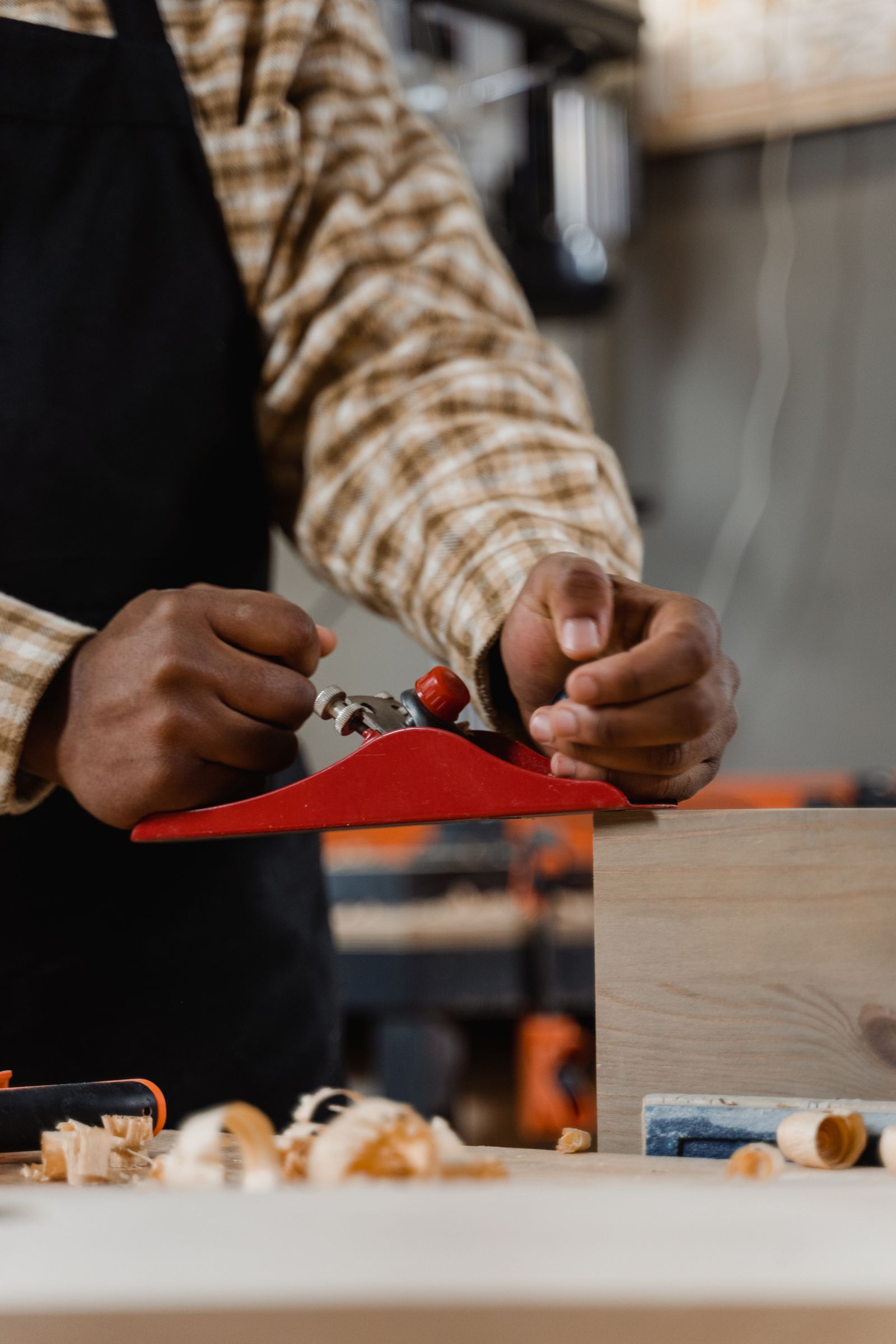 Craftsman finishing a piece by hand