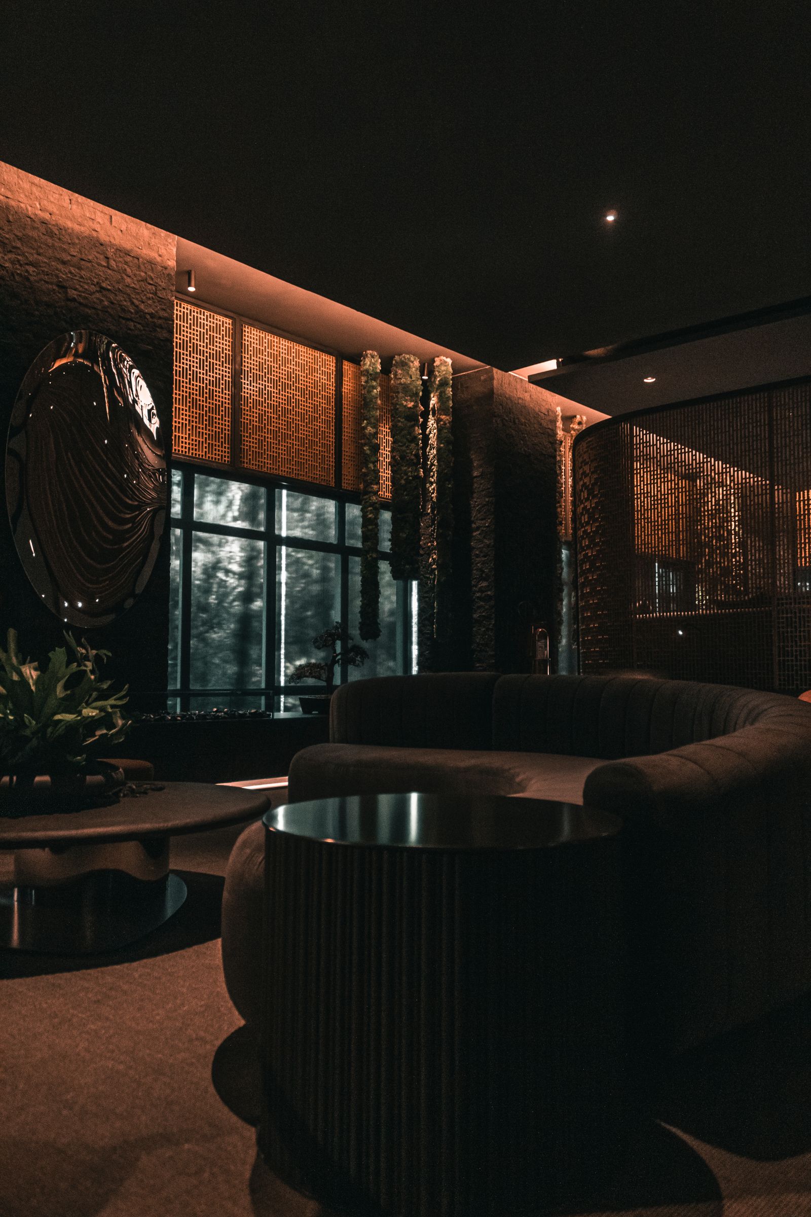 Bespoke joinery and furniture in a dark, design-led interior